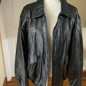 Men’s black Napoline Leather Outfitters coat. It is size XL ZIPPER closure